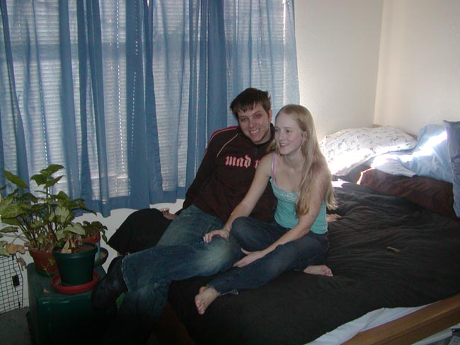 dec 4 05 - amy & steve & curtains sitting cute