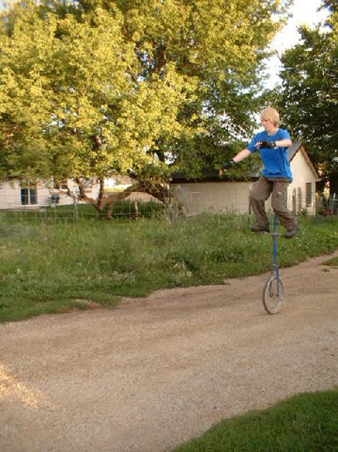 mark unicycle giraffe
