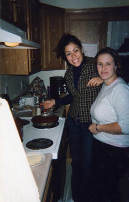 midd cheer - anna rita and katie cooking dinner