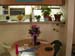 Apartment - Dining table, birthday flowers, kitchen, plants